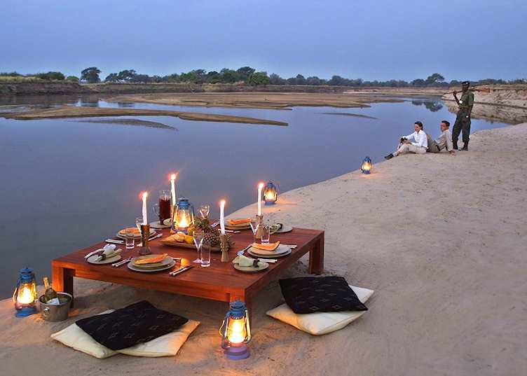 Dining in the bush at Luangwa River Lodge, South Luangwa National Park