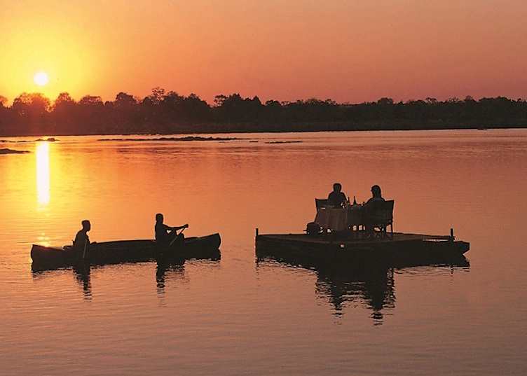 Dinner on the raft at Tongabezi