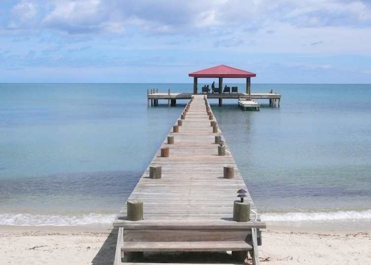 Pier and Palapa for relaxation at Roberts Grove, Placencia