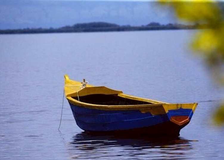 Boat moored on Lake Albert, Semliki Wildlife Reserve