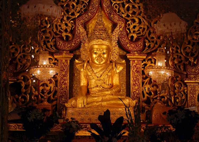 Golden image of Buddha at the Mahamuni pagoda near Mrauk U