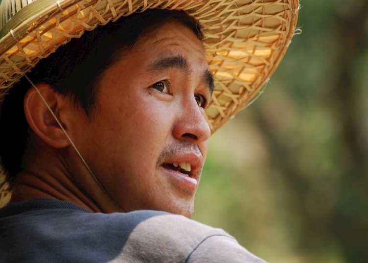 Boatman on the Ping River, Chiang Mai, Thailand