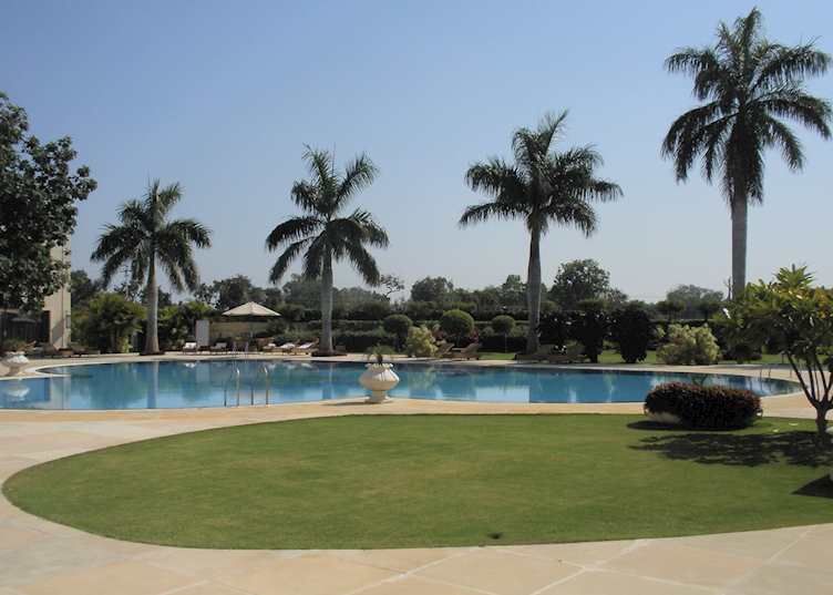 The Lalit Temple View swimming pool and gardens, Khajuraho