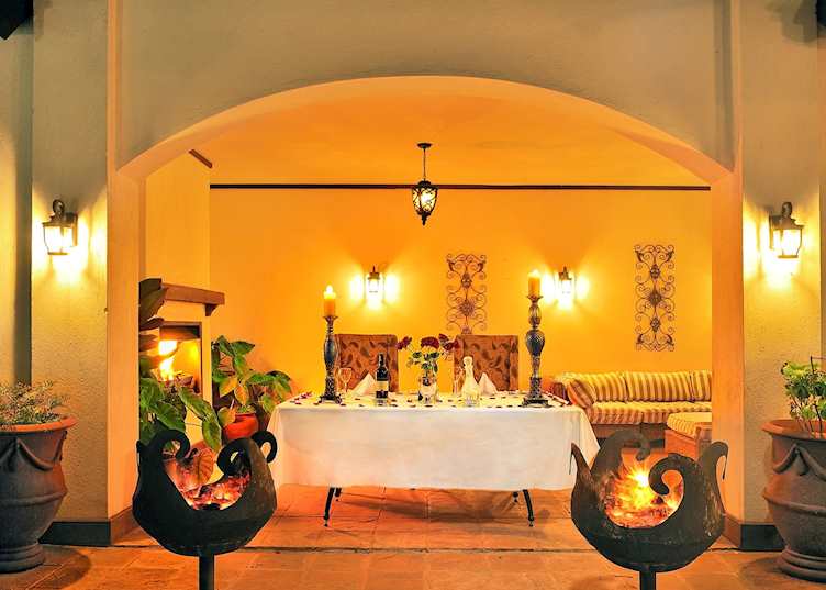 Dining by the pool, The Manor at Ngorongoro, Karatu