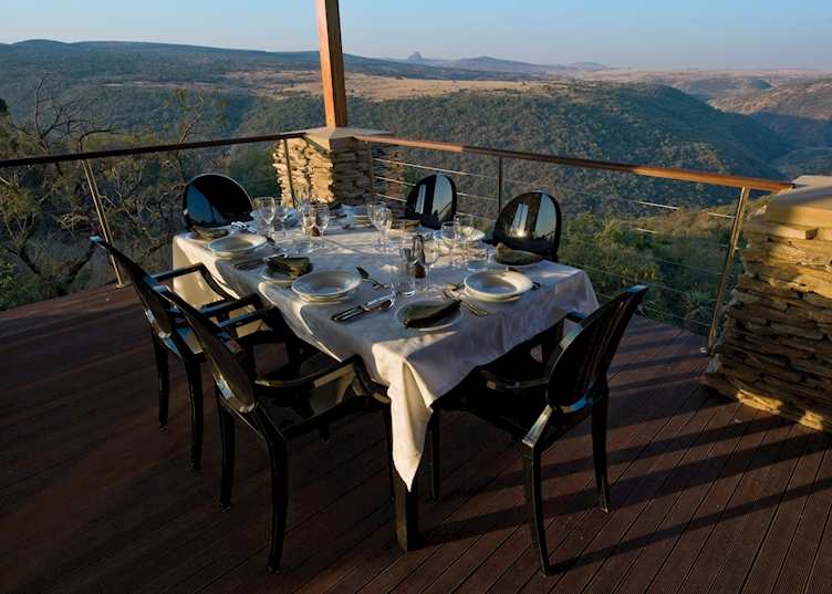 Dining on the balcony at Fugitive's Drift Lodge