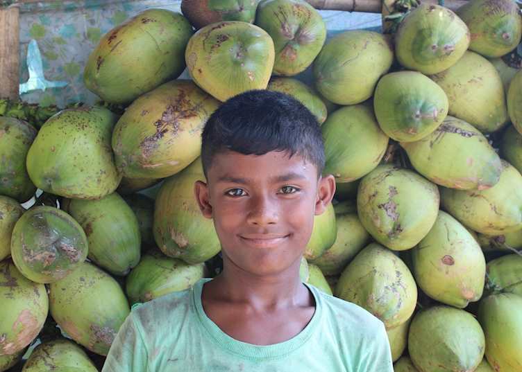 Coconut seller, Assam