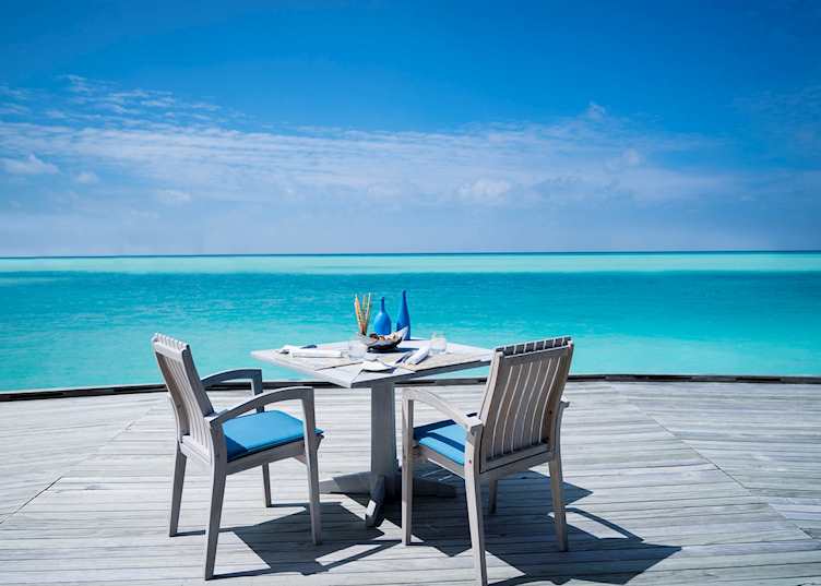 Outdoor dining at Anantara Dhigu Maldives Resort