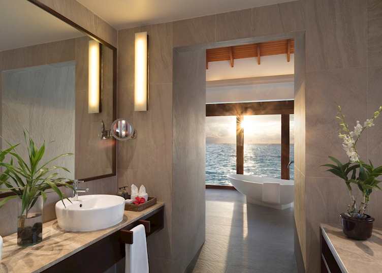 Sunset Over Water Suite bathroom, Anantara Dhigu Maldives Resort