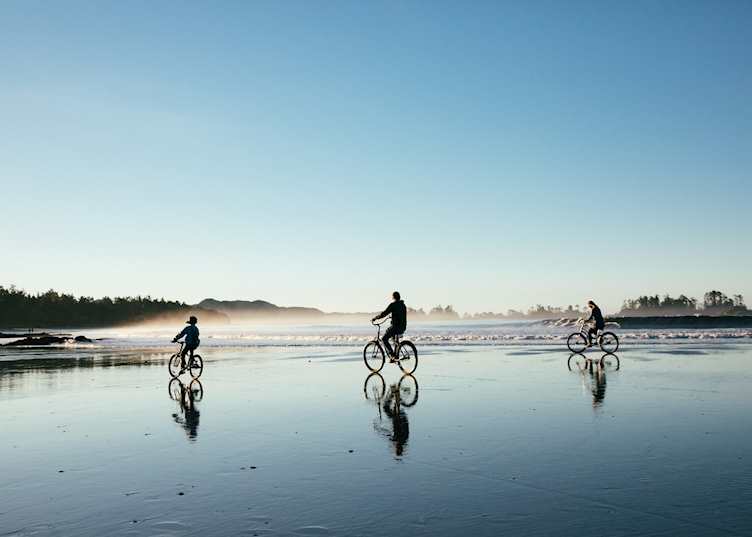 Cycling on Chesterman Beach near The Wickaninnish Inn, Tofino