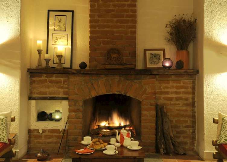 Cozy fireplace in the main house at Shergarh