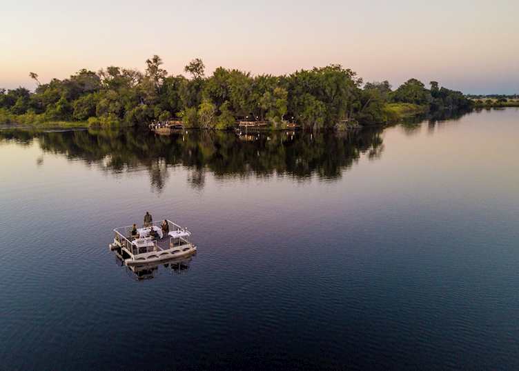 Xugana Island Lodge barge dinner 