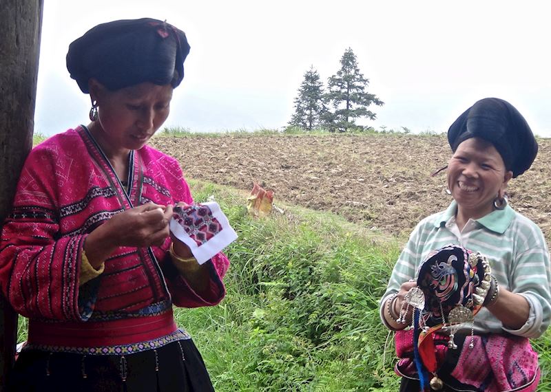 Yao tribeswoman making handicrafts