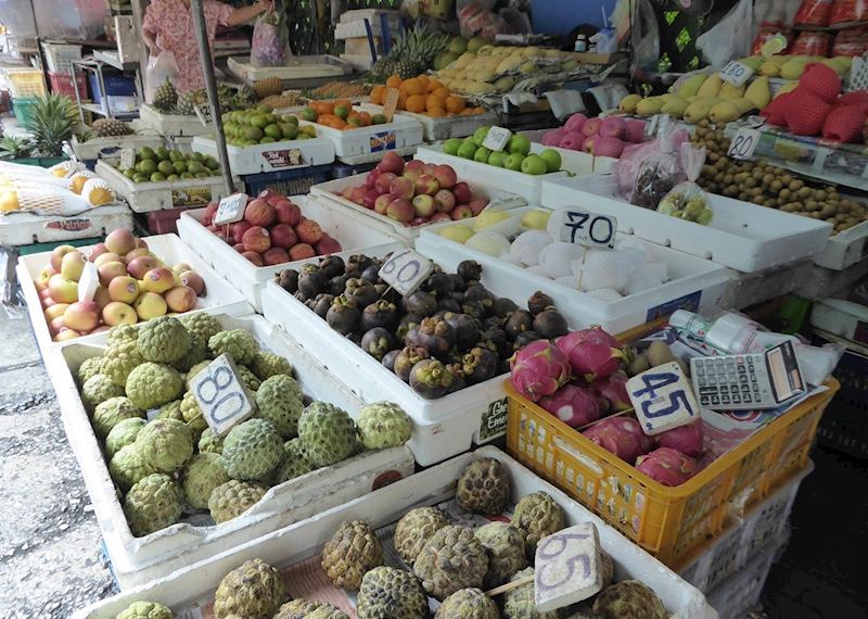Different fruits being sold at a local market