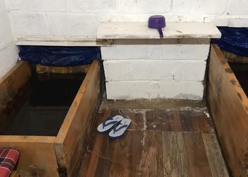A traditional hot stone bath, Bhutan