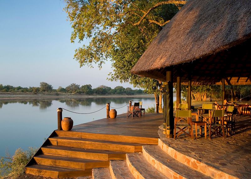 Dining by the river, Nkwali Safari Camp, South Luangwa National Park