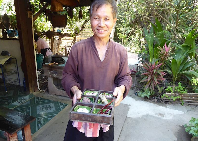 Mr Prapat with the ingredients for a curry paste