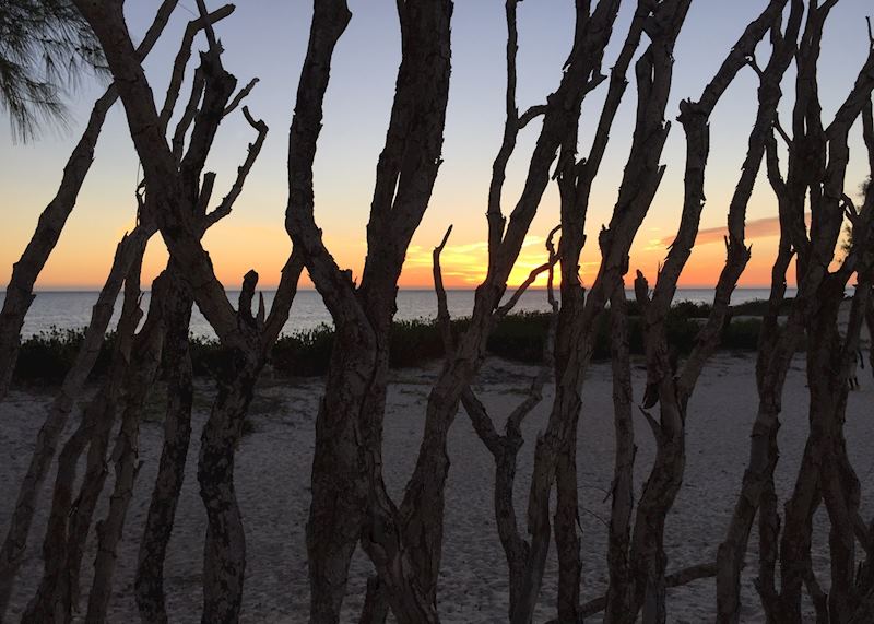 View of the beach through the fence in Tulear