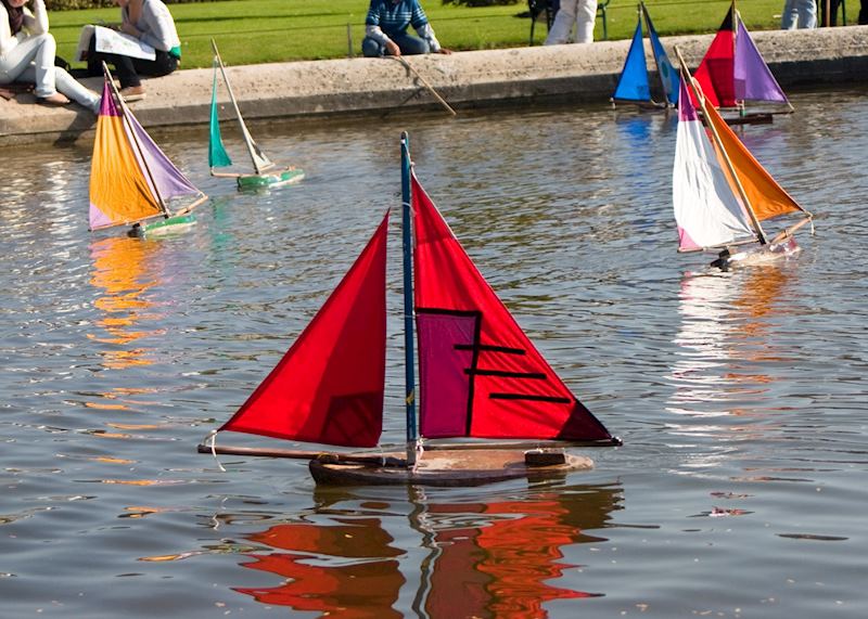 Miniature sailboats at a park, Paris