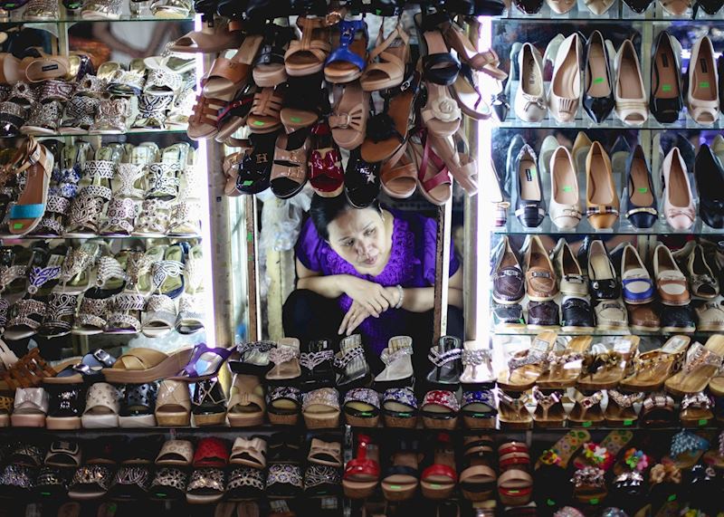 Shoe seller at a Saigon market