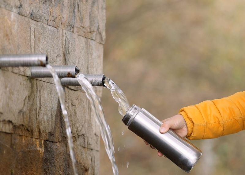 Refilling a reusable water bottle