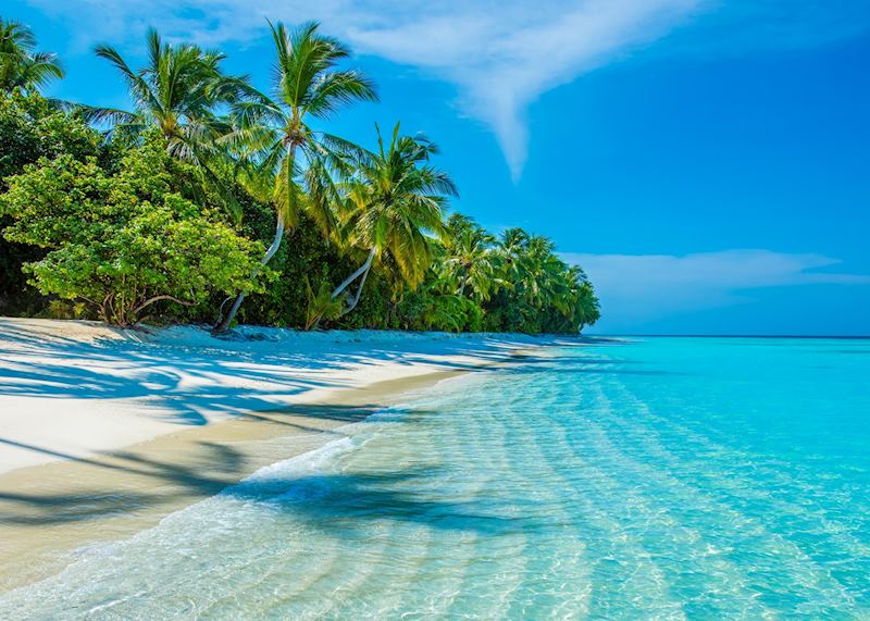 Deserted island beach on Raa Atoll