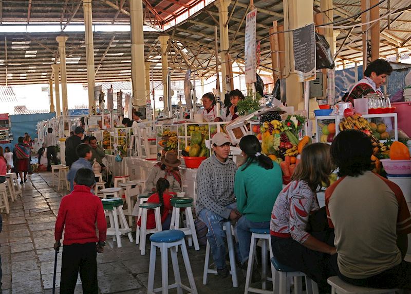 Juice stands at the market in Cuzco, Peru