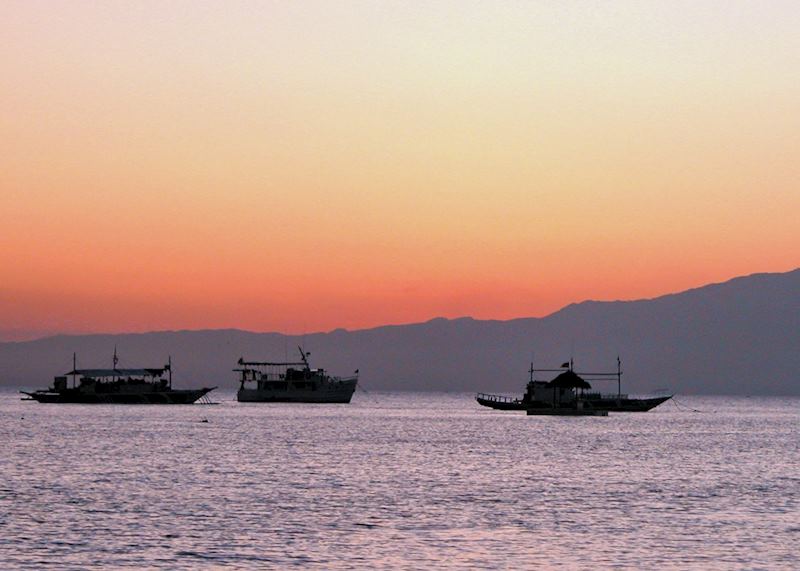 The sun setting behind Negros as seen from Siquijor, Philippines