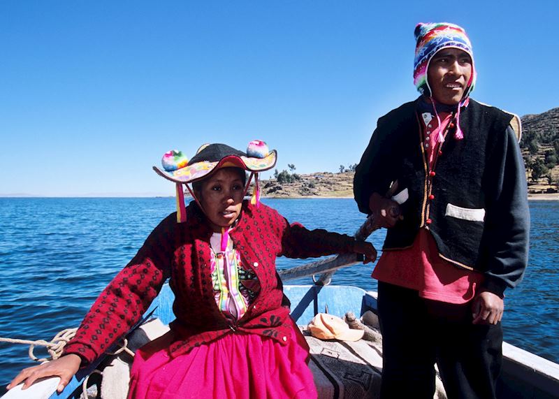 Locals sailing on Lake Titicaca