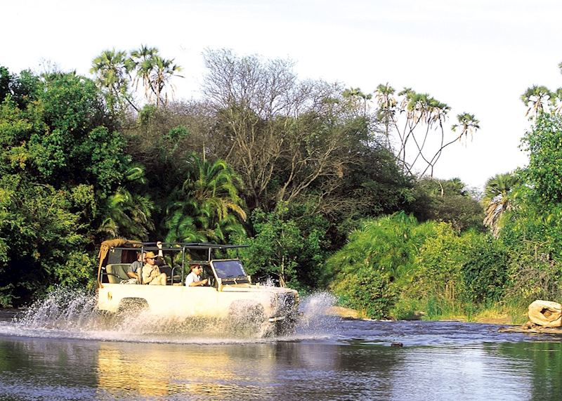 Driving through a river in Meru
