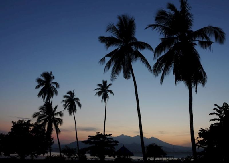 Sire Beach at sunrise with Mount Rinjani in the background, Lombok