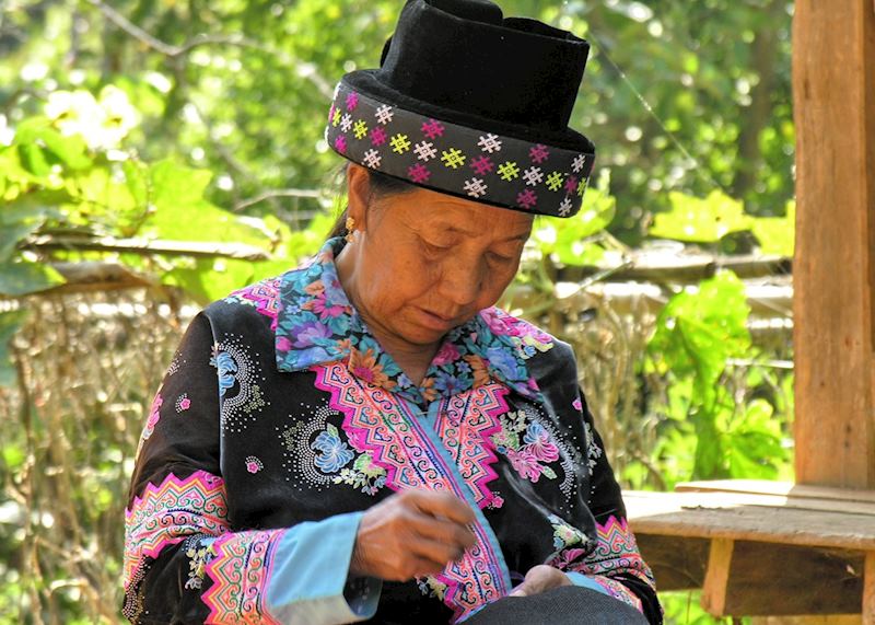 Hmong lady sewing, northern Thailand