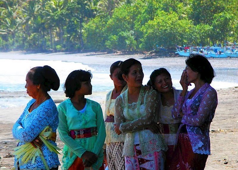 Local women attaending a ceremony in Medewi, Indonesia