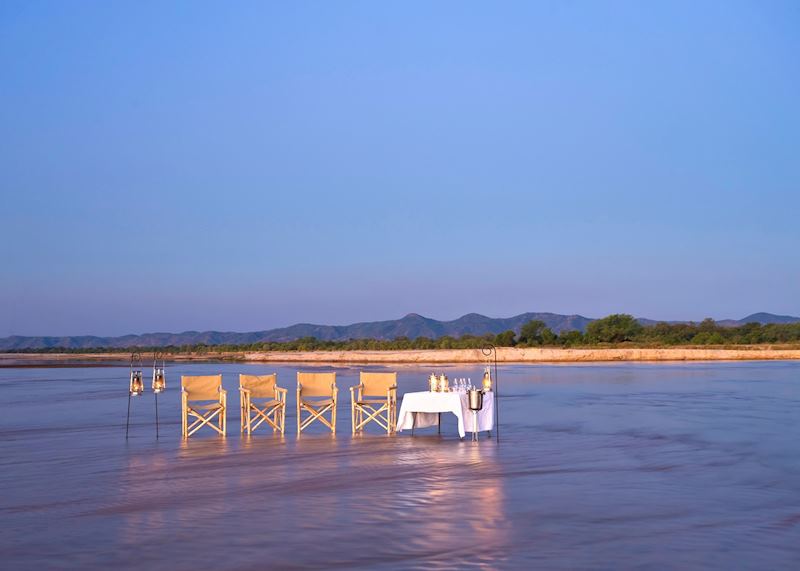Sundowner drinks in the Kapamba River