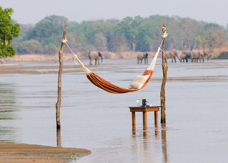 Relaxing in the Kapamba River by the Bushcamp Company