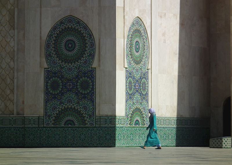 Woman outside The Hassan II Mosque, Casablanca, Morocco