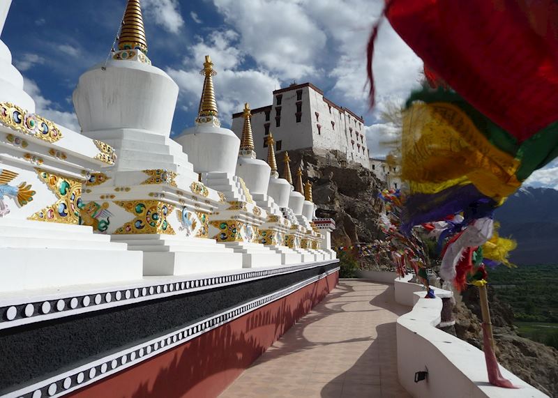 Stupas and prayer flags at Thikse monastery