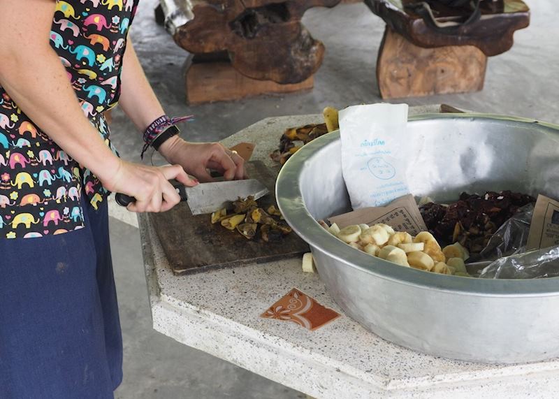 Making food for the elephants