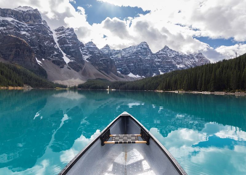 Canoeing on Moraine Lake, near Lake Louise, Alberta