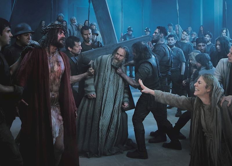 A scene of Jesus and the cross in The Passion Play